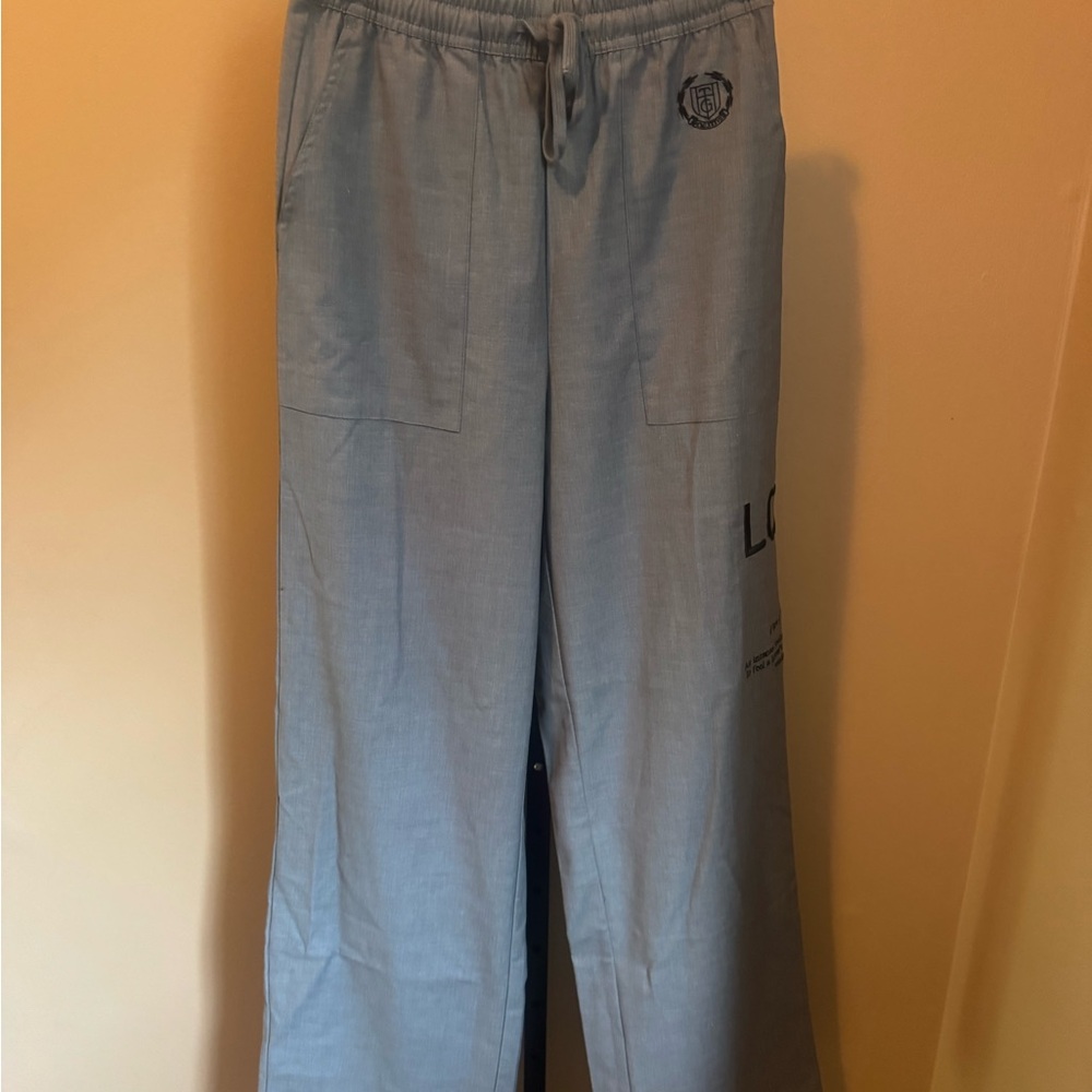 Light Blue Pants with Logo Detail